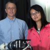 Researchers Tomasz Tkaczyk and Ye Wang, who earned her doctorate this year at Rice, led the development of a portable spectrometer able to capture far more data much quicker than other fiber-based systems. The TuLIPSS camera will be useful for quick analysis of environmental and biological data. Photo by Jeff Fitlow