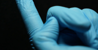 Photo of the spectrometer chip on a gloved finger