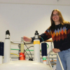 Photo of Anika Mauel on top of spectrometer magnet